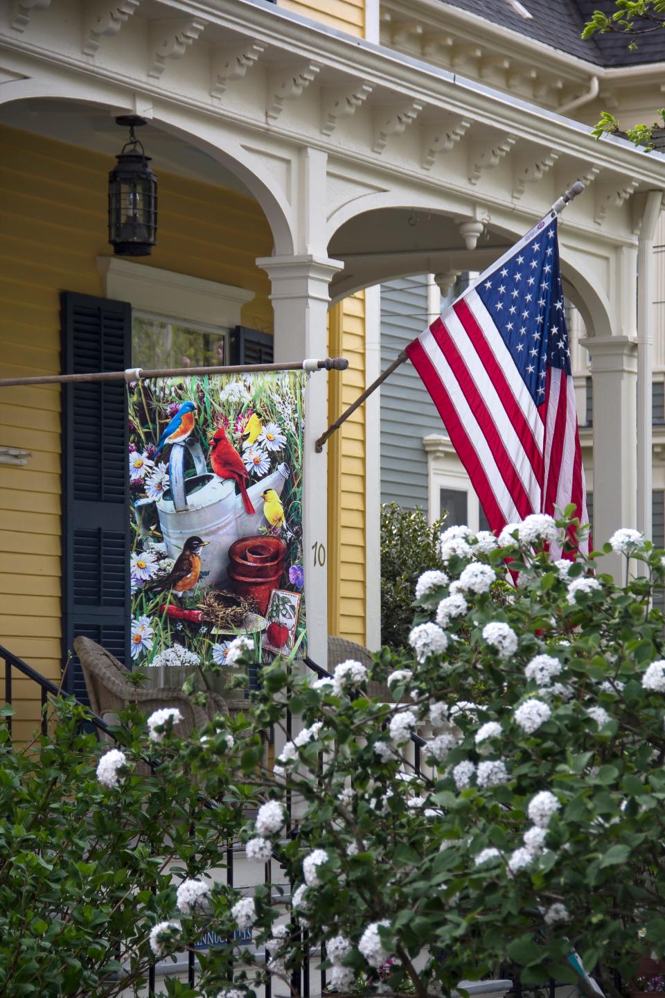 American flags and red-white-and-blue buntings hang from a house in Bristol in 2020.