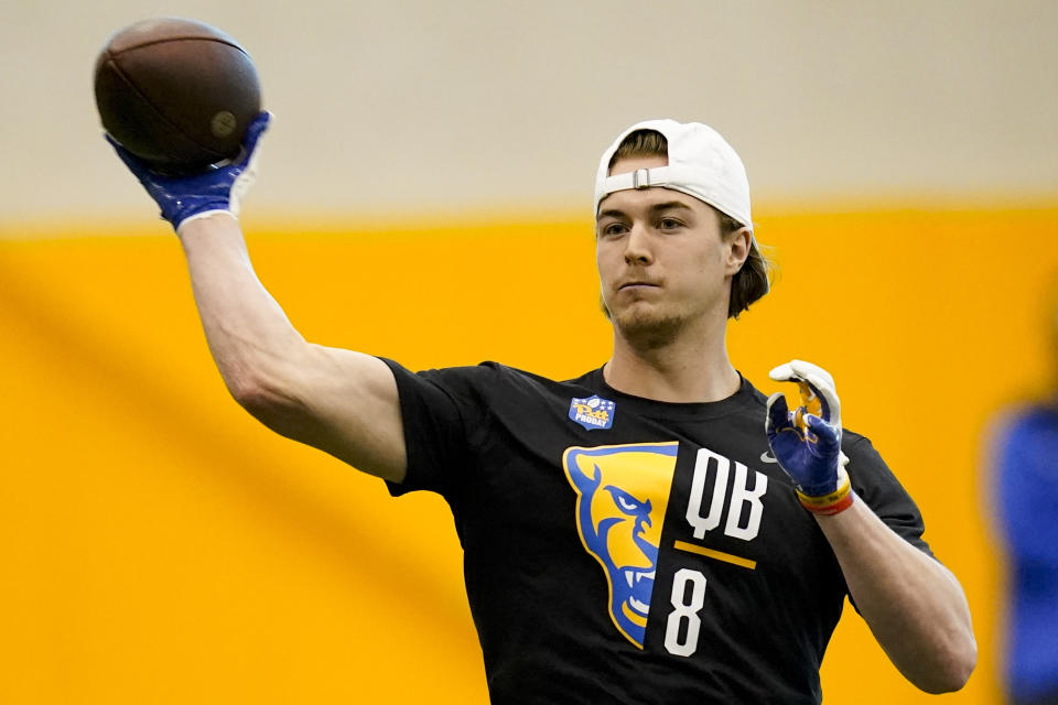 Pitt QB Kenny Pickett goes through passing drills during the school's pro day. (AP Photo/Keith Srakocic)