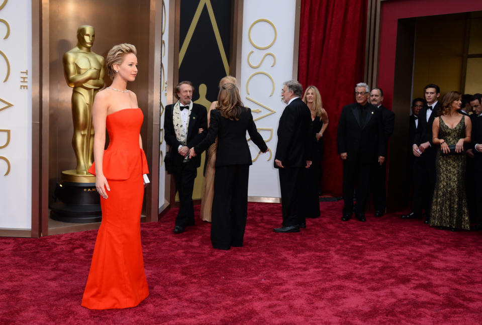 Jennifer Lawrence arrives at the Oscars on Sunday, March 2, 2014, at the Dolby Theatre in Los Angeles. (Photo by Jordan Strauss/Invision/AP)