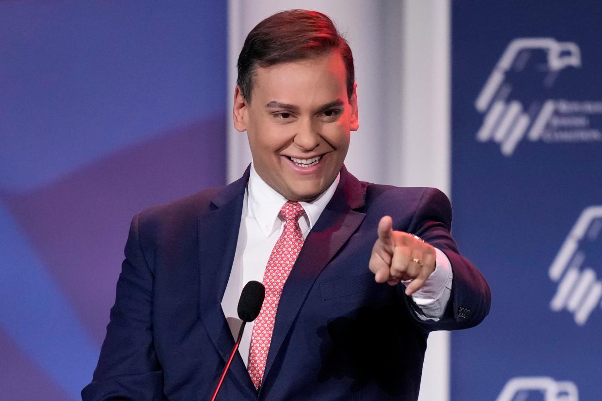 Rep.-elect George Santos, R-New York, speaks at an annual leadership meeting of the Republican Jewish Coalition, Nov. 19, 2022, in Las Vegas. Weeks after winning a district that helped Republicans secure their razor-thin House majority, the congressman-elect Santos is under investigation in New York after acknowledging he lied about his heritage, education and professional pedigree as he campaigned for office.