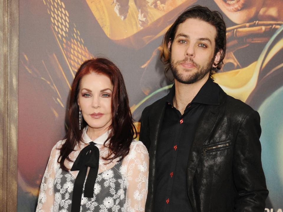 Actress/business magnate Priscilla Presley (L) and son Navarone Garibaldi arrive at the "Mad Max: Fury Road" Los Angeles Premiere at TCL Chinese Theatre IMAX on May 7, 2015