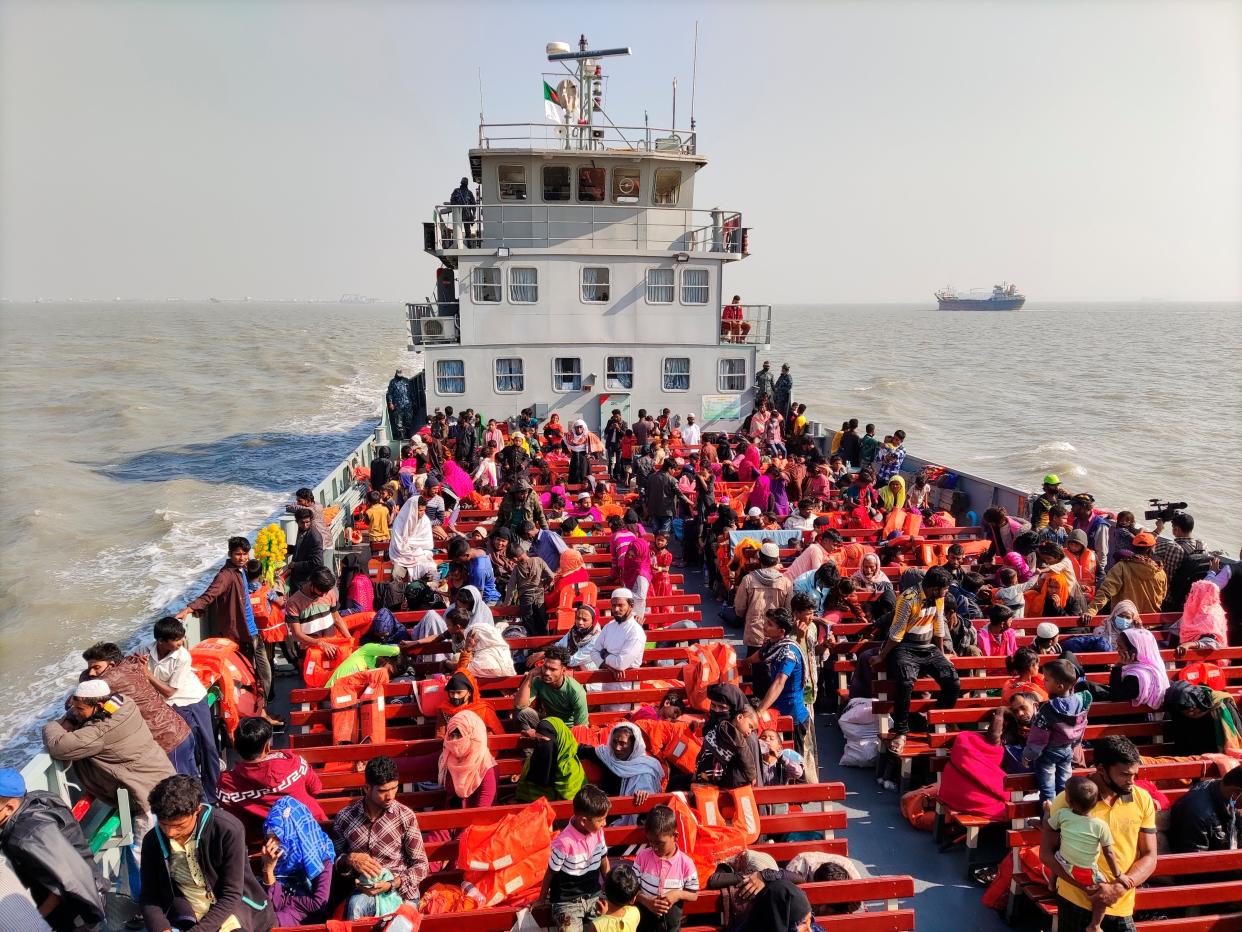 <p>File image: Rohingya refugees travel in a naval ship to be transported to an isolated island in the Bay of Bengal, in December 2020</p> ((AP Photo/Mahmud Hossain Opu))