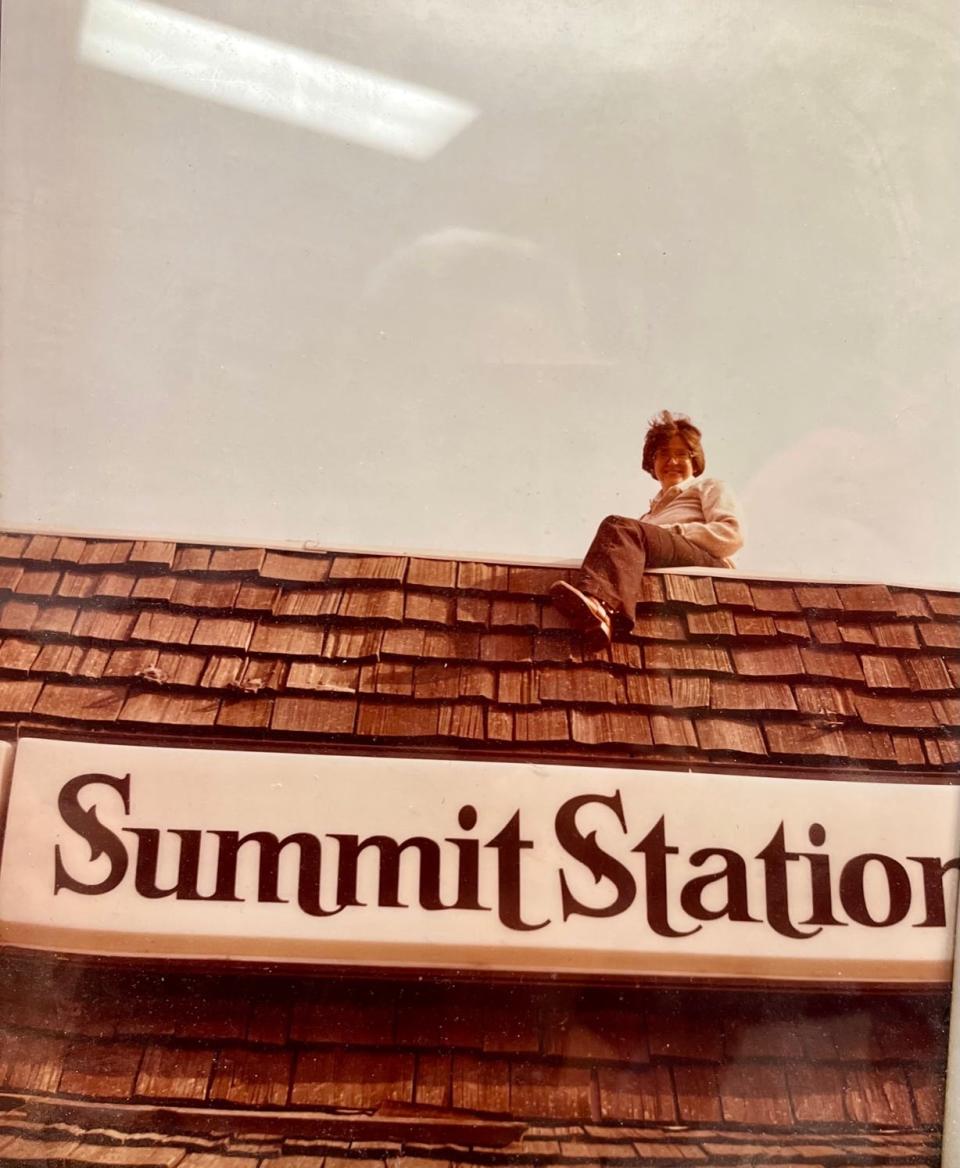Proprietor Petie Brown sits on the roof of Summit Station, which operated from 1970 to 2008, making it Ohio's longest-running lesbian bar. Former patrons will share stories about the bar at a gathering Saturday at WOSU Public Media's Ross Community Studio.