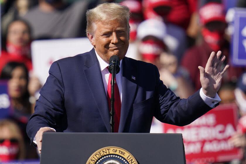 FILE - In this Oct. 28, 2020 file photo, President Donald Trump speaks at a campaign rally in Bullhead City, Ariz. Newly released records show the top Republicans in Arizona's largest county dodged calls from Donald Trump and his allies in the aftermath of the 2020 election, as the then-president sought to prevent the certification of Joe Biden's victory in key battleground states. (AP Photo/John Locher, File)