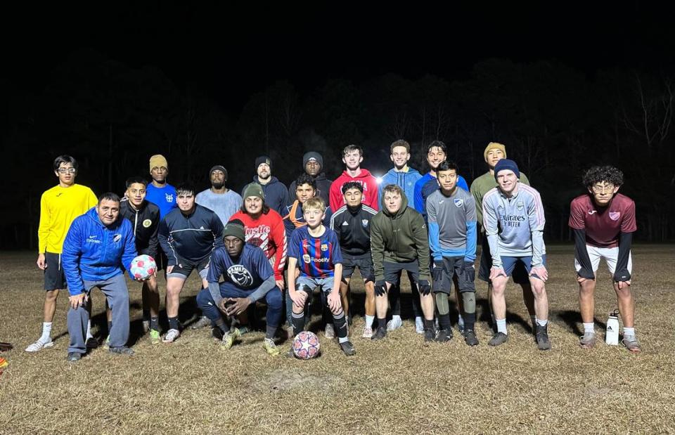 Current members and alumni of Club Beaufort de Fútbol gathered for a pickup game Thursday night at the former Beaufort County fairgrounds, located off Sammie Lane in Burton. Each player signed their name on a soccer ball in honor of Jerrieme “L.J.” Washington, a 14-year-old team member who was killed in a drive-by shooting on New Year’s Day.