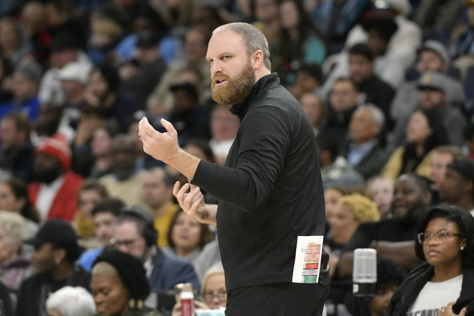 Memphis Grizzlies coach Taylor Jenkins calls to players during the first half of the team's NBA basketball game against the Oklahoma City Thunder on Friday, Nov. 18, 2022, in Memphis, Tenn. (AP Photo/Brandon Dill)