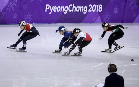 Elise Christie of Great Britain (#1) receives a second penalty and is disqualified for pushing Magdalena Warakomska of Poland (#31) while Lara Van Ruijven of the Netherlands (#54), Andrea Keszler of Hungary (#29) continue their race in Short Track Speed Skating Ladies 1000m series on day eleven of the PyeongChang 2018 Winter Olympic Games at Gangneung Ice Arena on February 20, 2018 in Gangneung, South Korea - Credit: Getty Images