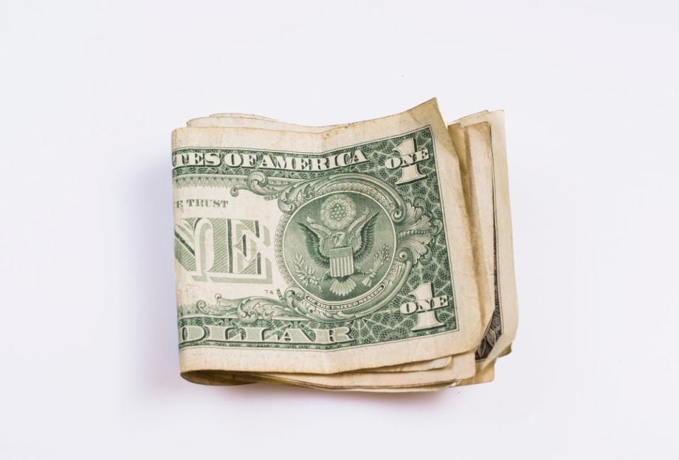 Folded dollar bills.