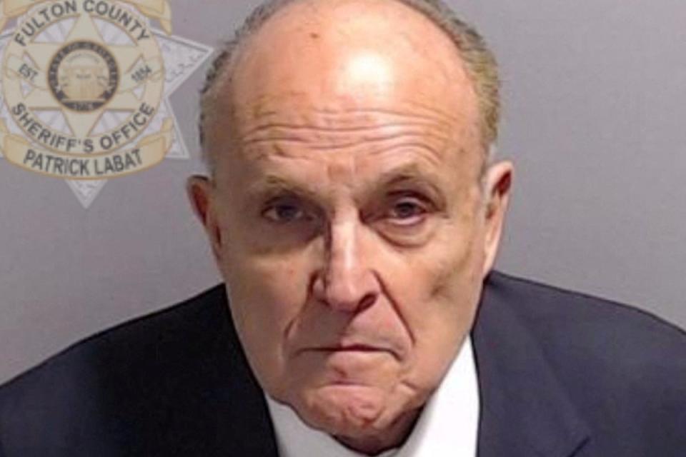 A mugshot of former New York mayor Rudy Giuliani, released by the Fulton County Sheriff's Office after he handed himself in on Wednesday (via REUTERS)