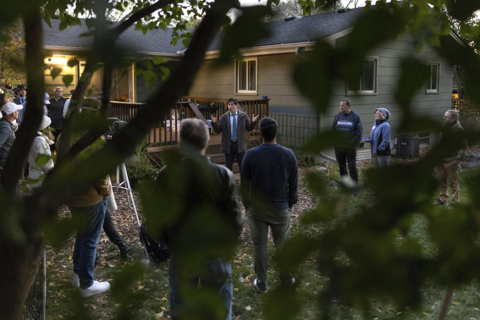 Minneapolis Mayor Jacob Frey speaks to his constituents at his "Mayor on the Block" event on Tuesday, Oct. 26, 202,1 in Minneapolis. (AP Photo/Christian Monterrosa)