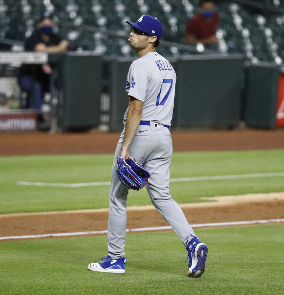 Joe Kelly makes face at Astros while walking off the field.