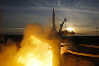 The Soyuz-FG rocket booster with Soyuz MS-11 space ship carrying a new crew to the International Space Station, ISS, blasts off at the Russian leased Baikonur cosmodrome, Kazakhstan, Monday, Dec. 3, 2018. The Russian rocket carries U.S. astronaut Anne McClain, Russian cosmonaut Оleg Kononenko‎ and CSA astronaut David Saint Jacques. (AP Photo/Dmitri Lovetsky)