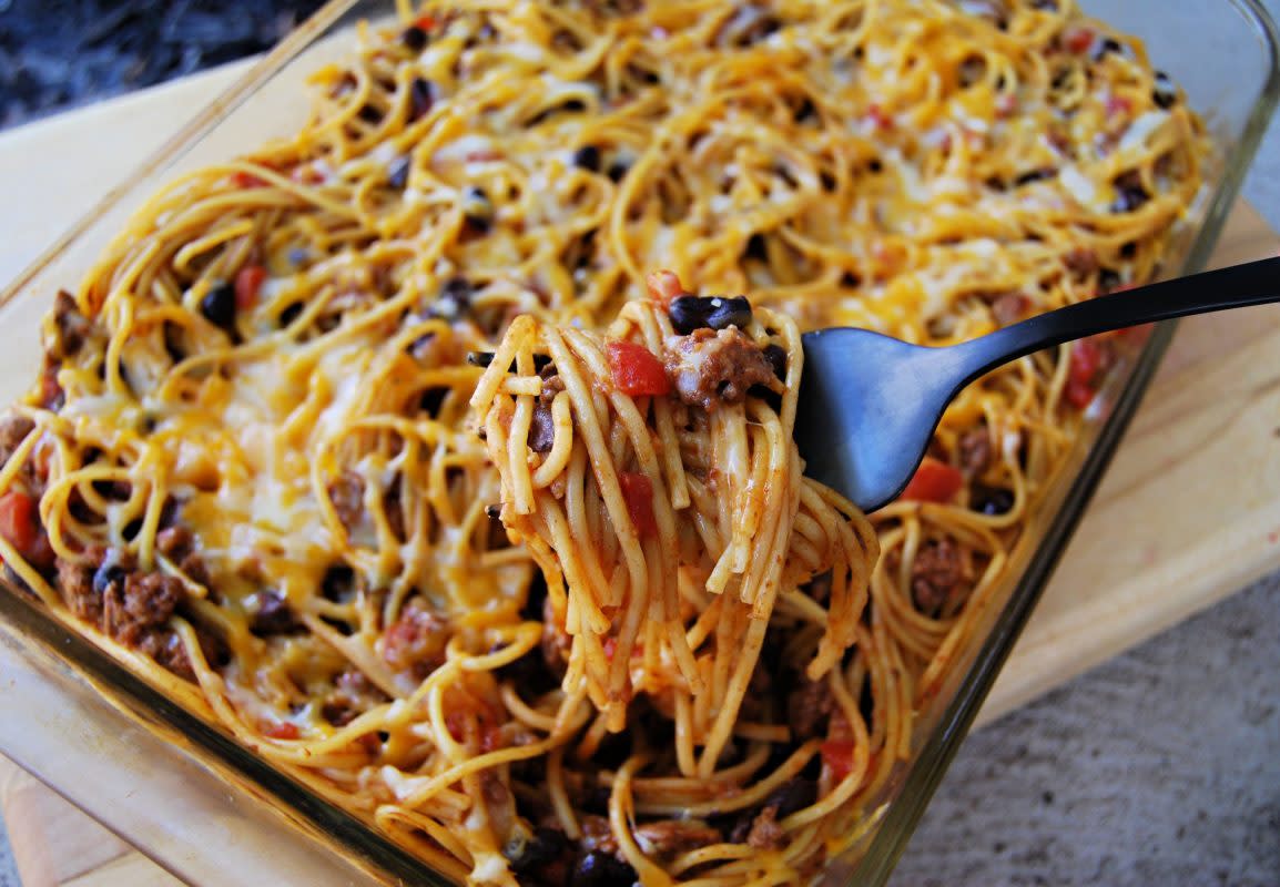 <p>Krista Marshall</p><p>Combine pasta night and Mexican night with this mash-up of flavors! </p><p><strong>Cost: $11.18</strong></p><p><strong>Get the recipe: <a href="https://parade.com/902424/kristamarshall/switch-up-taco-tuesday-with-taco-spaghetti-for-mexitalian-greatness/" rel="nofollow noopener" target="_blank" data-ylk="slk:Taco Spaghetti;elm:context_link;itc:0;sec:content-canvas" class="link rapid-noclick-resp">Taco Spaghetti</a></strong></p>