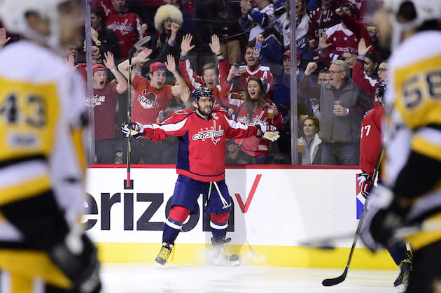 WASHINGTON, DC - JANUARY 11: Alex Ovechkin #8 of the Washington Capitals celebrates after scoring a goal for his 1000th career point against the Pittsburgh Penguins in the first period during an NHL game at Verizon Center on January 11, 2017 in Washington, DC. (Photo by Patrick McDermott/NHLI via Getty Images)