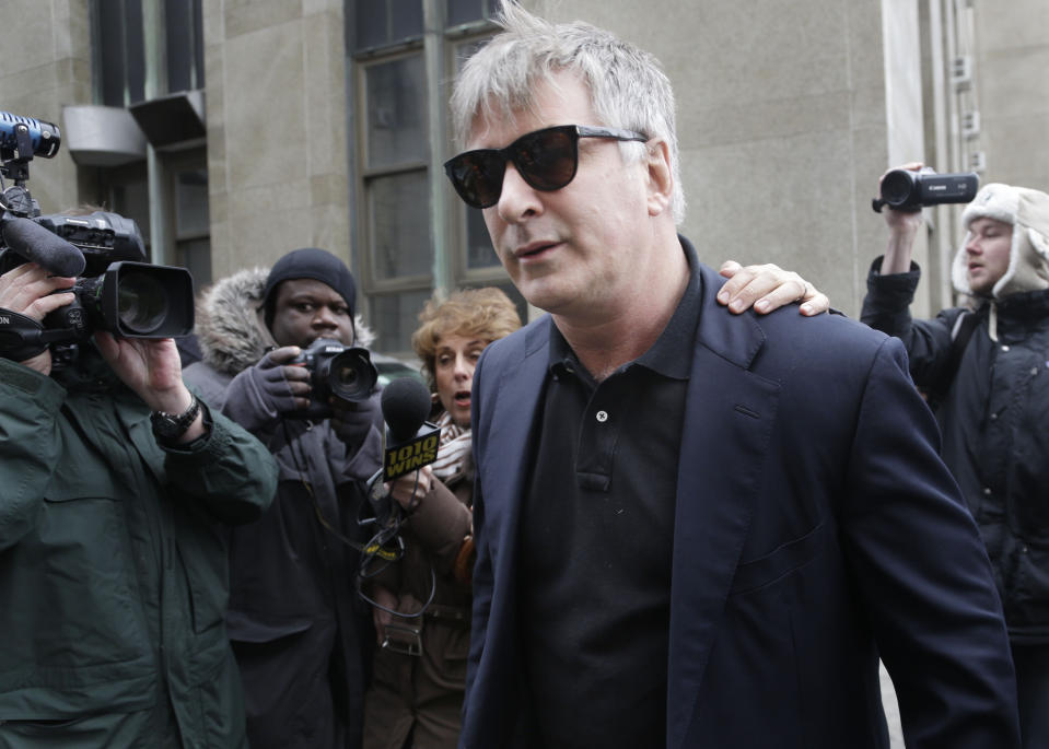 FILE - In this Tuesday, Nov. 12, 2013 file photo, actor Alec Baldwin leaves criminal court in New York. Police in New York City say actor Alec Baldwin has been arrested for riding a bike the wrong way on the street and acting belligerently toward the arresting officers. Police say the “30 Rock” star was taken into custody Tuesday, May 13, 2014. They say two officers noticed him riding his bicycle the wrong way on 16th Street near Fifth Avenue near Union Square Park. They say the notoriously hot-headed actor was asked to show identification. That’s when they say he acted belligerently toward the officers and was arrested. He’s since been released. (AP Photo/Seth Wenig, File)