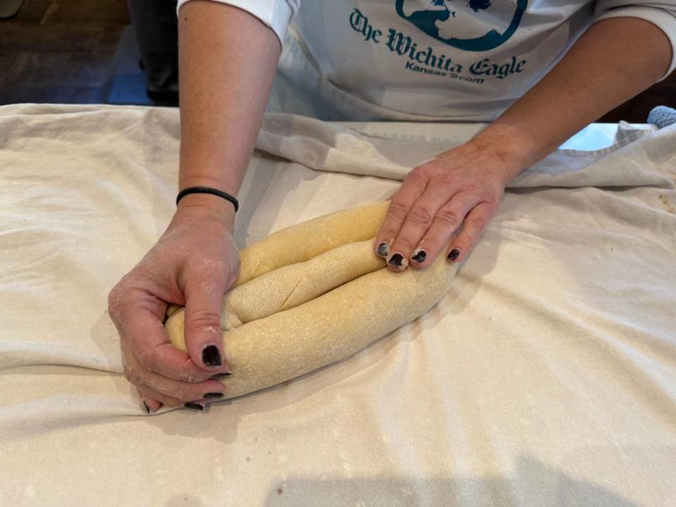 Each loaf of povitica takes two batches of dough, rolled with filling then stacked on top of each other with more filling in between each layer.