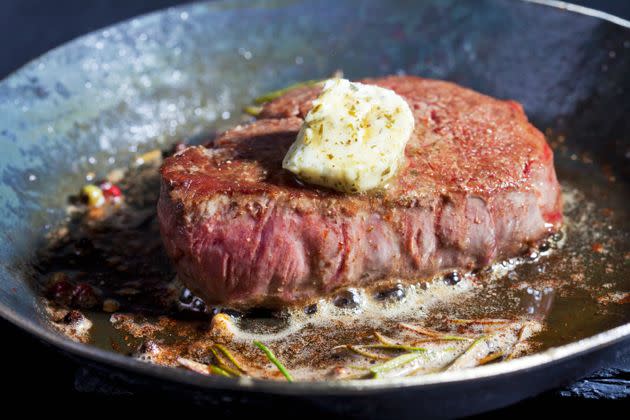 Get out your cast iron skillet and compound butter for a reverse seared steak. (Photo: Westend61 via Getty Images)