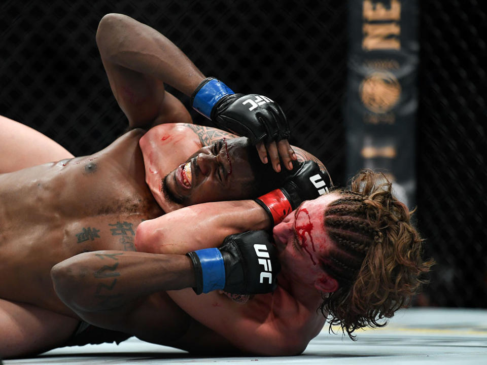 Oct 18, 2019; Boston, MA, USA; Brendan Allen (red) fights Kevin Holland (blue) in a heavyweight bout during UFC Fight Night at the TD Garden. Mandatory Credit: Bob DeChiara-USA TODAY Sports