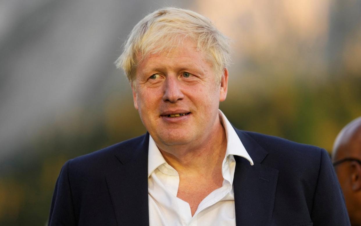 Boris Johnson is due to fly back from a holiday in the Caribbean - REUTERS
