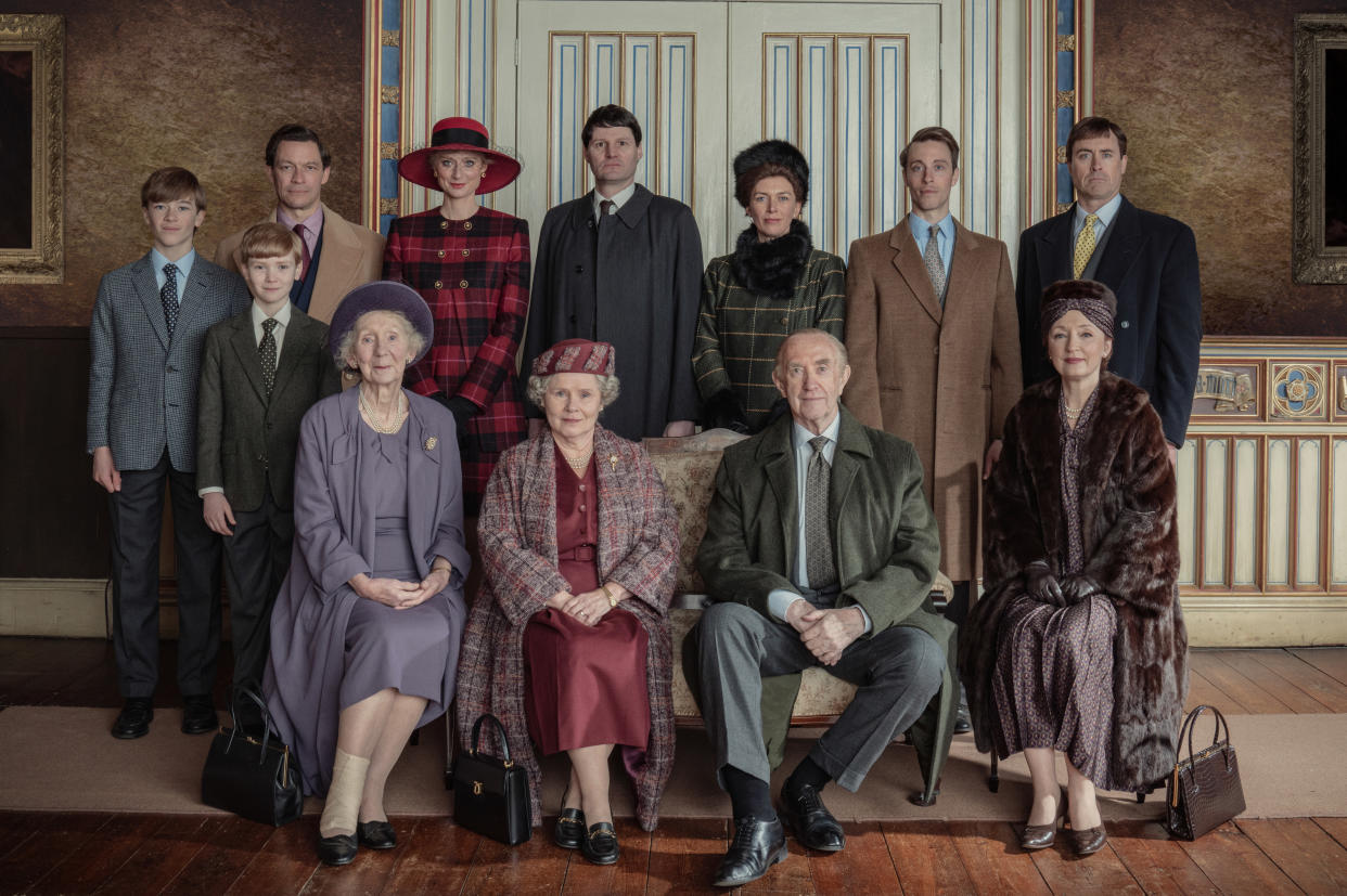 The Crown S5: Family portrait: Back row L-R Senan West, Will Powell, Dominic West, Elizabeth Debicki, Theo Fraser Steele, Claudia Harrison, Sam Woolf, James Murray. Front row L-R Marcia Warren, Imelda Staunton, Jonathan Pryce, Lesley Manville. (Netflix)
