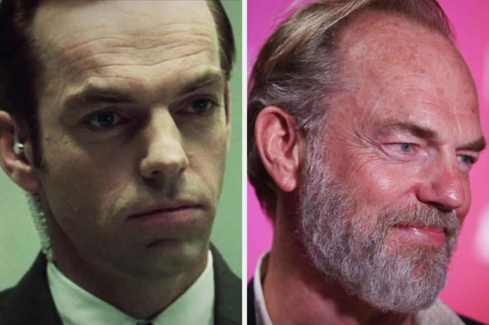 Agent Smith dressed in a suit with an ear device, Hugo Weaving smiling with a beard and longer hair