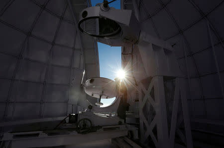 Sunlight beams through the dome of the solar tunnel telescope at the Kodaikanal Solar Observatory, India, February 3, 2017. REUTERS/Danish Siddiqui