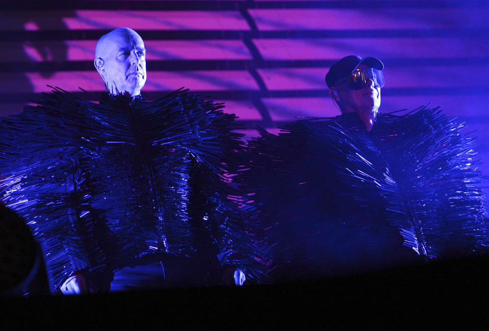 FILE - Musicians Neil Tennant, left, and Chris Lowe of the British duo Pet Shop Boys perform during the Berlin Festival on the grounds of the former Tempelhof airport in Berlin, Germany, Friday Sept. 6, 2013. Forty years and 50 million record sales after the Pet Shop Boys rose to fame with “West End Girls,” the iconic British duo is releasing a new album. “Nonetheless” is their 15th studio album. It arrives Friday, April 26, 2024. (Britta Pedersen/dpa via AP, File)