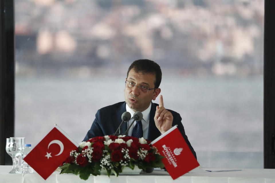 Ekrem Imamoglu, the new Mayor of Istanbul from Turkey's main opposition opposition Republican People's Party (CHP) talks to members of foreign media a day after he took over office, in Istanbul, Friday, June 28, 2019. Imamoglu said Friday he was prepared against any attempts by the government to restrict his powers while emphasizing his willingness to work with Turkish President Recep Tayyip Erdogan.(AP Photo/Lefteris Pitarakis)