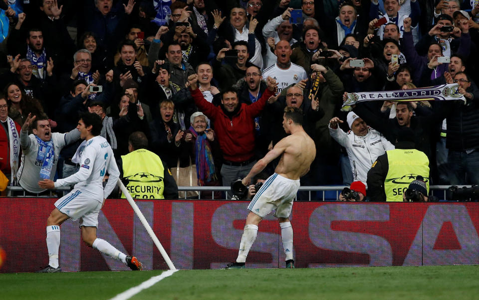 <p>Soccer Football – Champions League Quarter Final Second Leg – Real Madrid vs Juventus – Santiago Bernabeu, Madrid, Spain – April 11, 2018 Real Madrid’s Cristiano Ronaldo celebrates in front of fans after scoring their first goal REUTERS/Stringer </p>