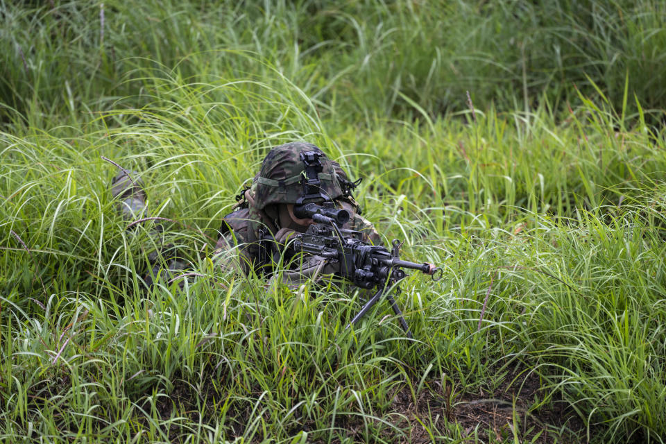 A Japan's Self-Defense Force soldier takes part in a joint military drill between Japan Self-Defense Force, French army and U.S. Marines, at the Kirishima exercise area in Ebino, Miyazaki prefecture, southern Japan Saturday, May 15, 2021. (Charly Triballeau/Pool Photo via AP)