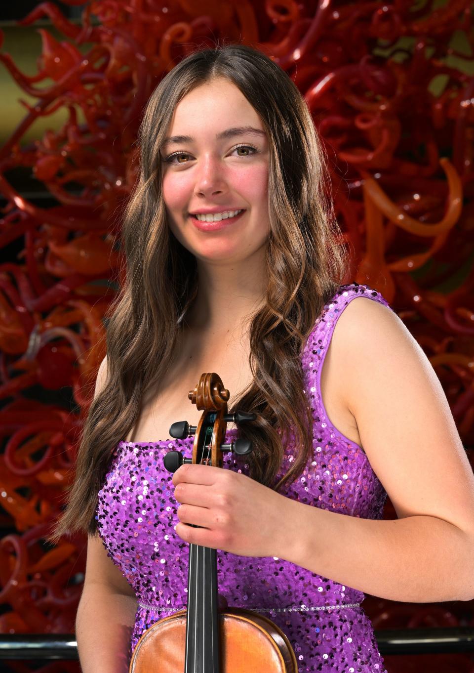 Alina Baron, violinist, poses for photos for the 2023 Salute to Youth Portraits at Abravanel Hall in Salt Lake City on Wednesday, Oct. 4, 2023. | Scott G Winterton, Deseret News