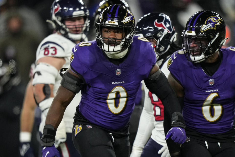 Baltimore Ravens linebacker Roquan Smith (0) celebrates a tackle against the Houston Texans during the second half of an NFL football AFC divisional playoff game, Saturday, Jan. 20, 2024, in Baltimore. (AP Photo/Matt Slocum)
