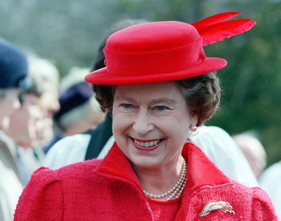 Queen Elizabeth opts for a matching red coat and hat after attending morning prayers at the Royal Chapel in Windsor park on April 20, 1986, just days before celebrating her 60th birthday.