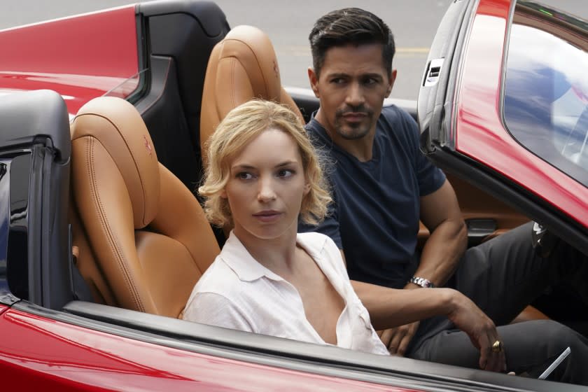 Magnum P.I. -- CBS TV Series, "Someone To Watch Over Me" -- Coverage of the CBS series Magnum P.I., scheduled to air on the CBS Television Network. Photo: Karen Neal/CBS ©2020 CBS Broadcasting, Inc. All Rights Reserved. Perdita Weeks and Jay Hernandez in "Magnum P.I. " on CBS.