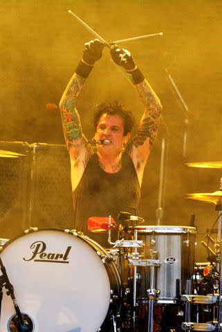 <p>Jim Dyson/Getty </p> Tommy Lee.