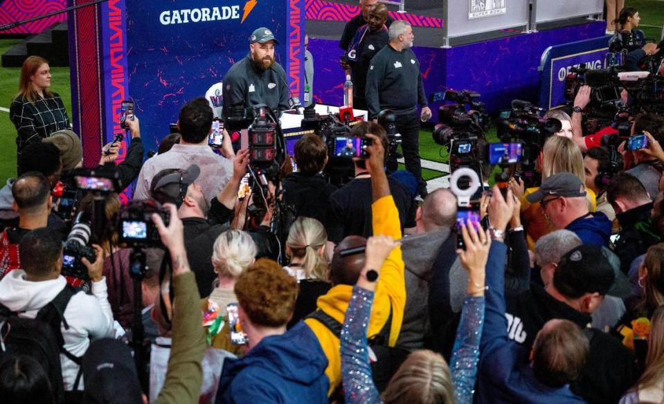Media members surround Kansas City Chiefs tight end Travis Kelce during Super Bowl LVIII’s Opening Night event at Allegiant Stadium on Monday, Feb. 5, 2024, in Las Vegas.
