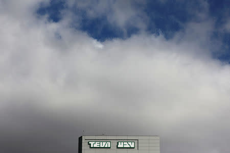 The logo of Teva Pharmaceutical Industries is seen on a part of their building in Jerusalem December 14, 2017. REUTERS/Ammar Awad