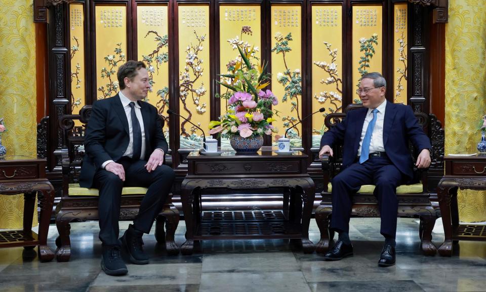 <span>Elon Musk met Chinese premier Li Qiang in Beijing on Sunday.</span><span>Photograph: Wang Ye/AP</span>