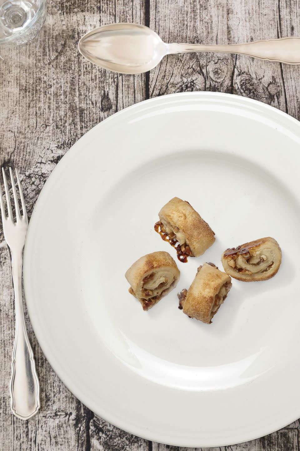 <p>These buttery, flaky bites are the perfect ending to any holiday dinner.</p><p>Get the<strong> <a href="https://www.goodhousekeeping.com/food-recipes/dessert/a46638/pecan-apricot-rugelach-recipe/" rel="nofollow noopener" target="_blank" data-ylk="slk:Pecan-Apricot Rugelach recipe;elm:context_link;itc:0;sec:content-canvas" class="link ">Pecan-Apricot Rugelach recipe</a></strong>.</p>