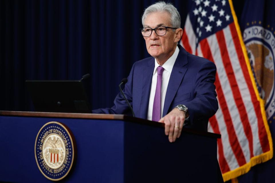 Jerome Powell speaking at a news conference.