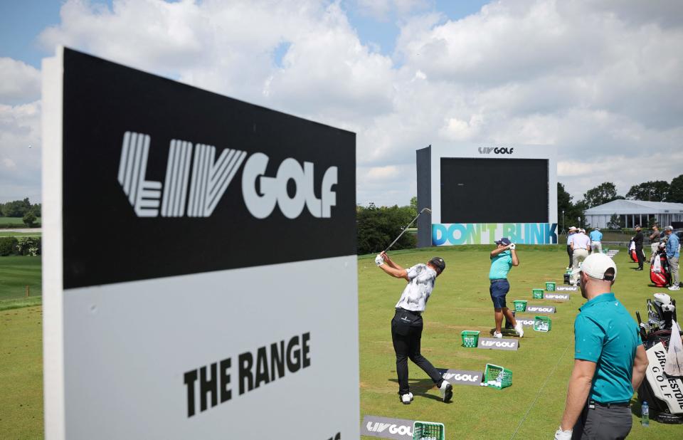 Players practice on the driving range ahead of the forthcoming LIV Golf Invitational Series event at The Centurion Club in St Albans, north of London.