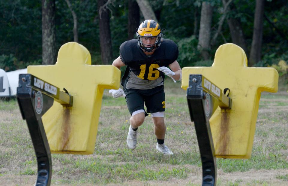 NORTH EASTHAM -- 08/29/22 -- Corey Vendetti works through a drill Monday morning. Nauset Regional High School football is back in action. A practice was held Monday morning.  To see more photos, go to  www.capecodtimes.com/news/photo-galleries. Merrily Cassidy/Cape Cod Times
