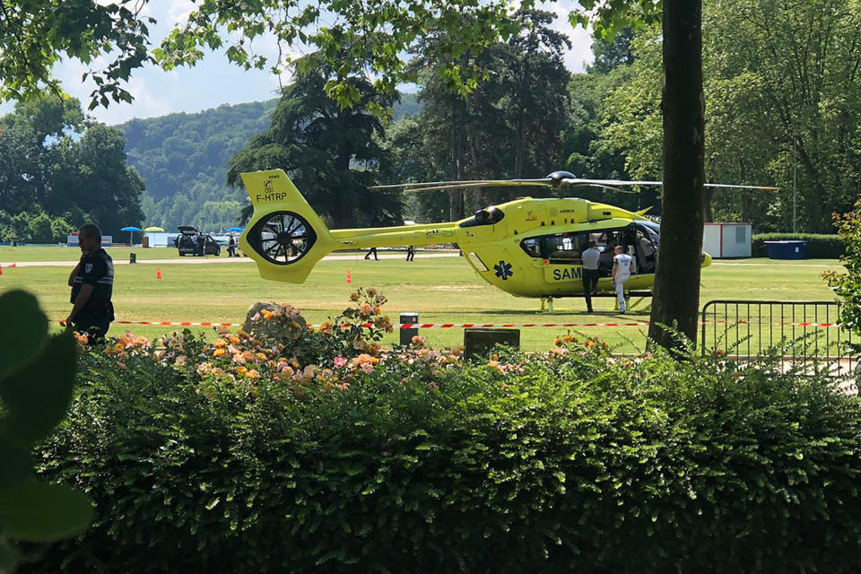 A medical helicopter is pictured after a knife attack in a park of Annecy, French Alps, Thursday, June 8, 2023. An attacker with a knife stabbed several young children and at least one adult, leaving some with life-threatening injuries, in a town in the Alps on Thursday before he was arrested, authorities said. (Florent Pecchio/L'Essor Savoyard via AP)