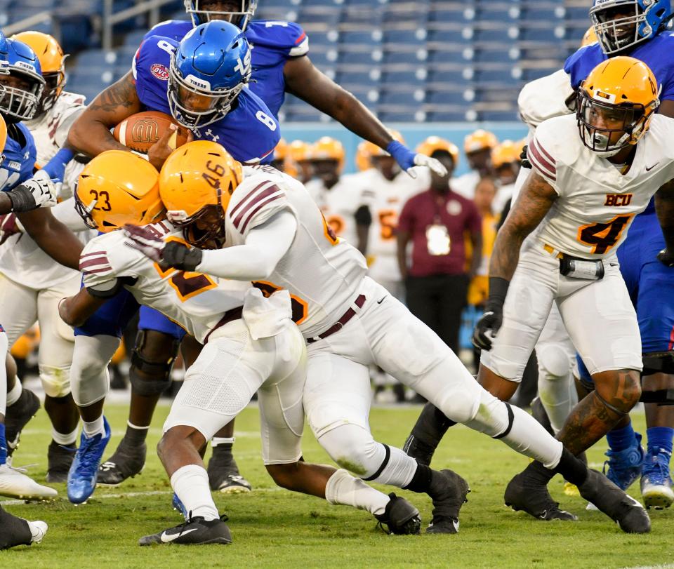 Tennessee State University quarterback Deveon Bryant (8) tries to push through the Bethune-Cookman University defense during TSU's Homecoming game at Nissan Stadium  in Nashville, Tenn., Saturday, Oct. 8, 2022. 