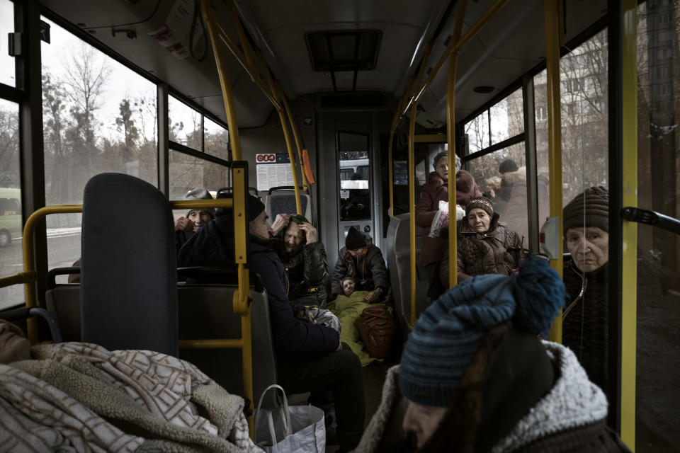 Elderly people wait on the bus 