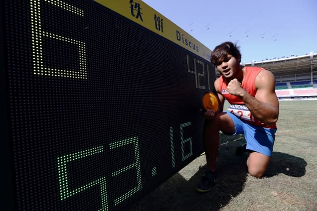 Muhammad Irfan Shamshuddin of Malaysia poses for a photograph after winning the gold medal in the men's discus throw during the 2013 Southeast Asian Games at Wunna Theikdi Stadium on December 15, 2013 in Nay Pyi Taw, Myanmar. (Photo by Suhaimi Abdullah/Getty Images)