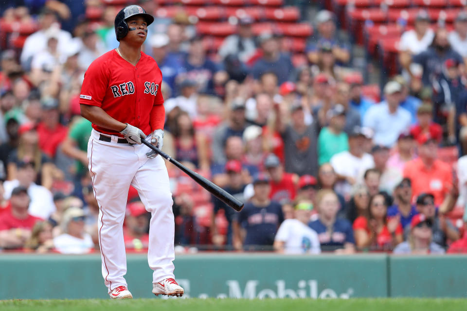 BOSTON, MASSACHUSETTS - AUGUST 18: Rafael Devers #11 of the Boston Red Sox watches his home run during the seventh inning against the Baltimore Orioles at Fenway Park on August 18, 2019 in Boston, Massachusetts. (Photo by Maddie Meyer/Getty Images)