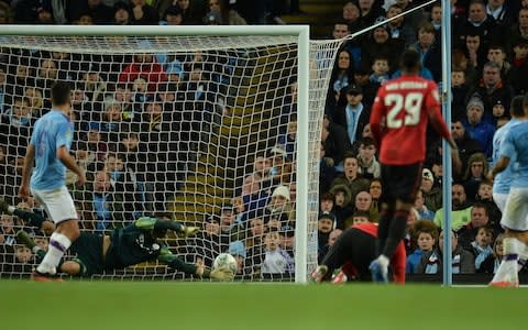 Goalkeeper Claudio Bravo of Manchester City concedes a goal by Nemanja Matic of Manchester United - Credit: REX