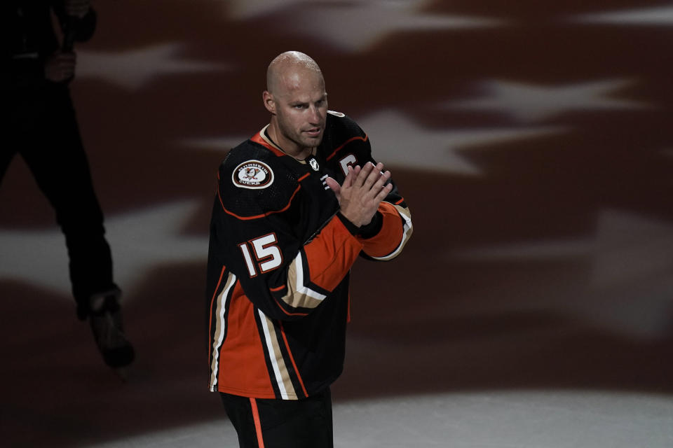 Anaheim Ducks' Ryan Getzlaf acknowledges the fans after the team's NHL hockey game against the St. Louis Blues Sunday, April 24, 2022, in Anaheim, Calif. Getzlaf, who is retiring at the conclusion of the season, played his last NHL game Sunday. (AP Photo/Jae C. Hong)