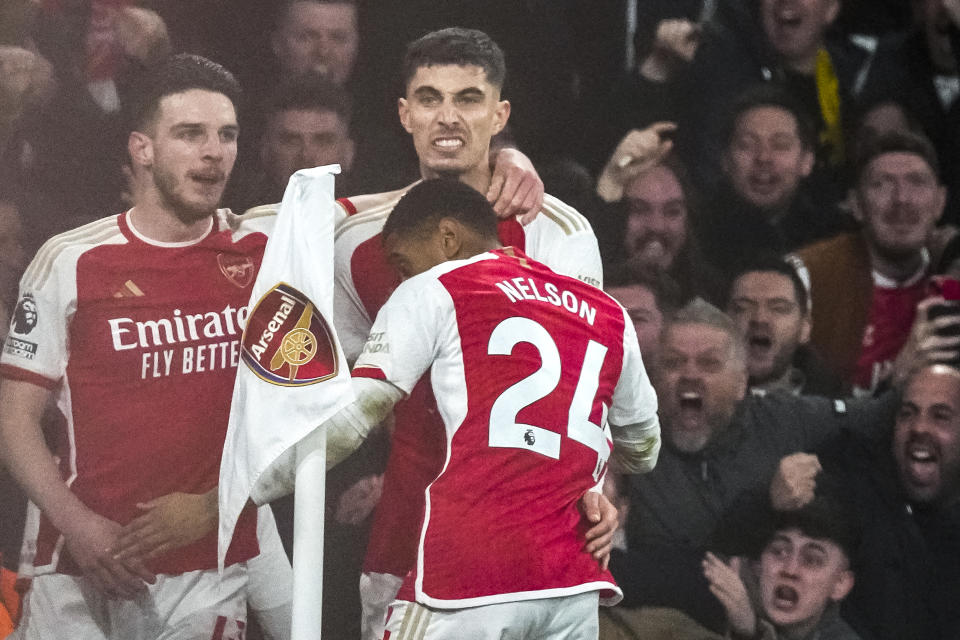 Arsenal's Kai Havertz, top right, celebrates with teammates after scoring his side's second goal during the English Premier League soccer match between Arsenal and Brentford at the Emirates Stadium in London, England, Saturday, March 9, 2024. (AP Photo/Frank Augstein)